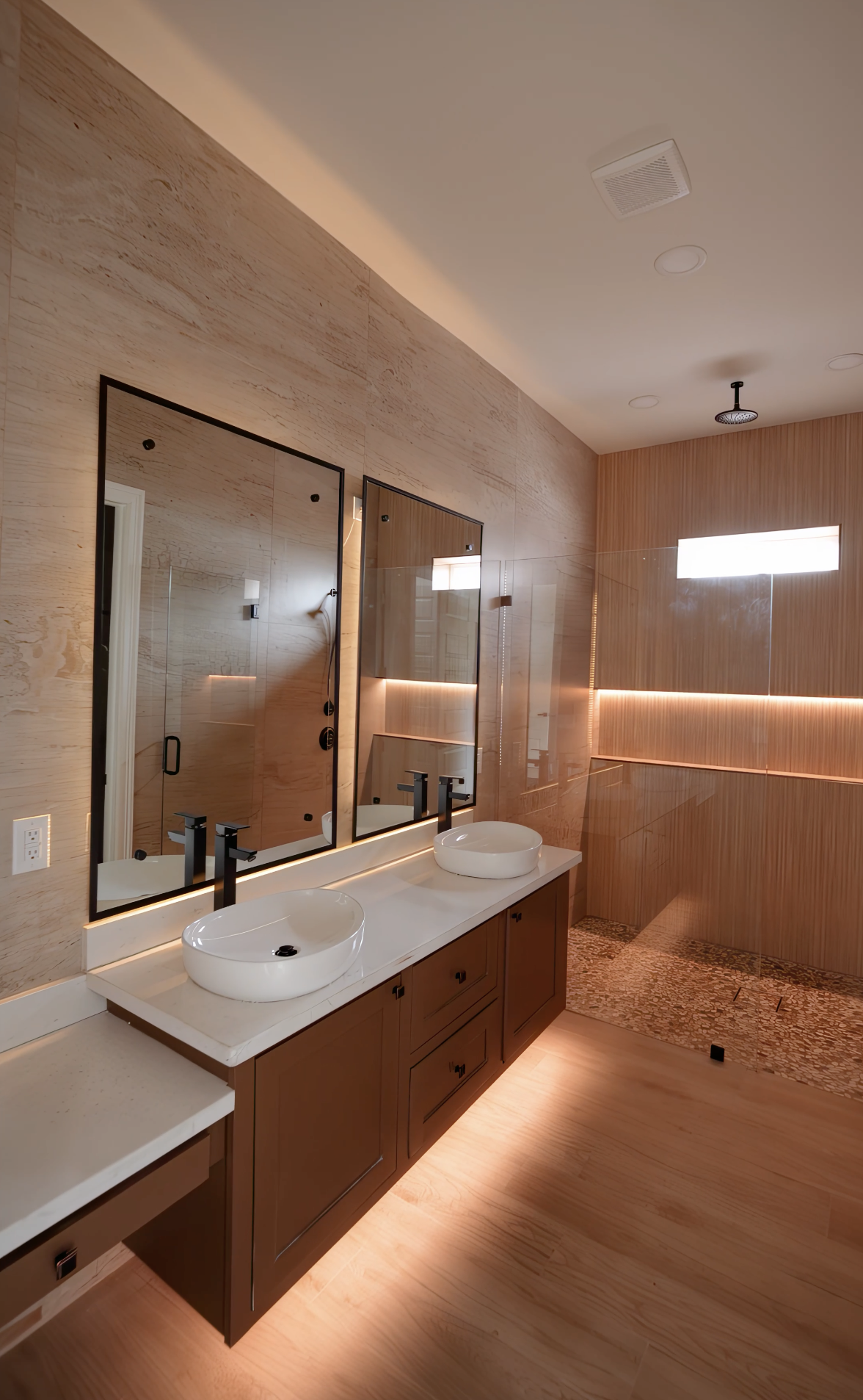 Primary bathroom with double vanity and walk-in shower